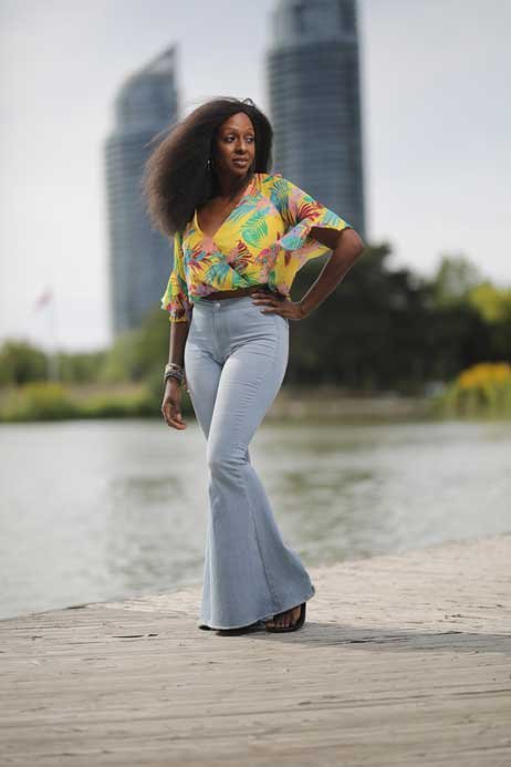 portrait of feminine black lady on the beach