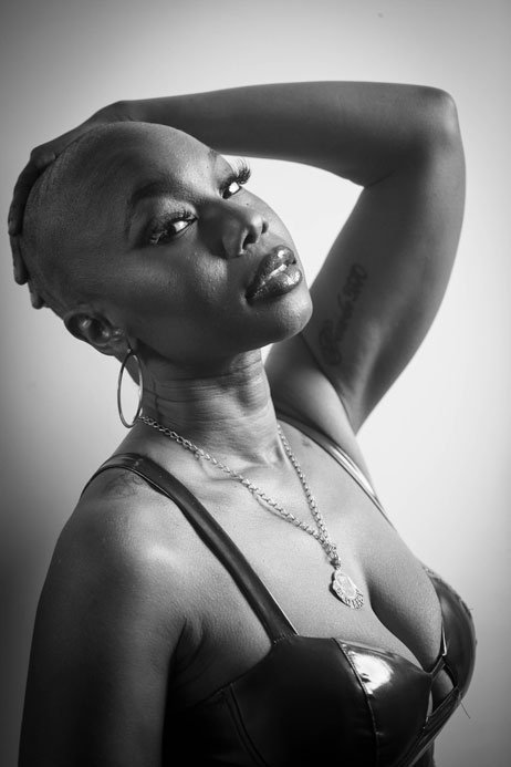 portrait of black lady with no hair