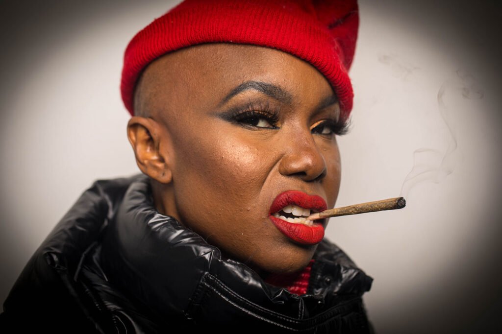 artistic portrait of black girl with red hot lipstick