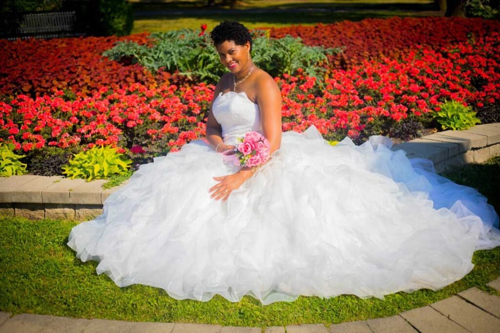 Bride-taking-pitcure-surrounded-by-flowers